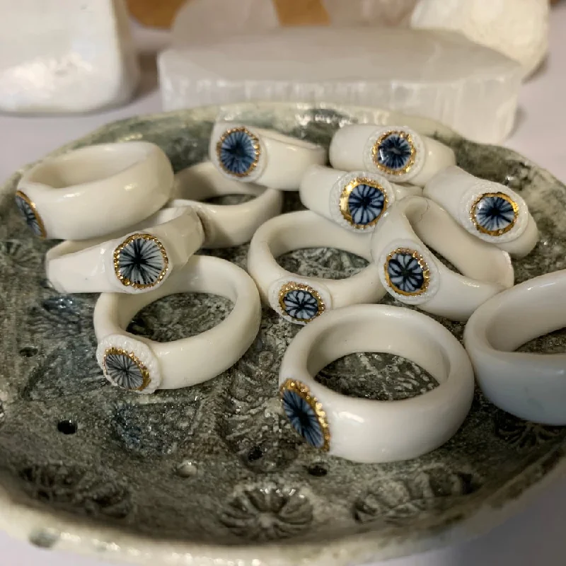 Layered metal rings-Porcelain band ring with blue star and gold lustre detail. Choose a size