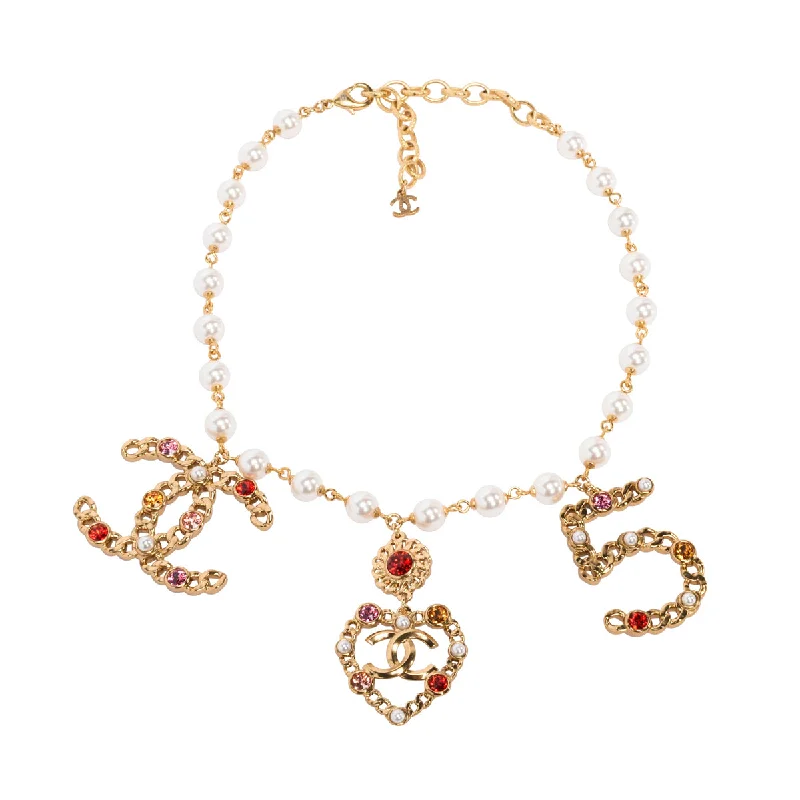 Alloy metal necklaces-Chanel Gold Tone Pearl & Crystal Coco Charm Choker Necklace